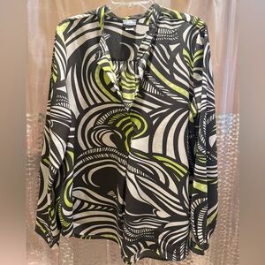 Manuheali’i XL Ka’iwi blouse. I’m between XL and 2X. Fits perfect.